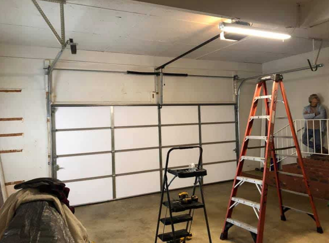 Create alt text for an image to optimize the SEO of the website, Garage Door Repair Services Fort Pierce FL keyword: