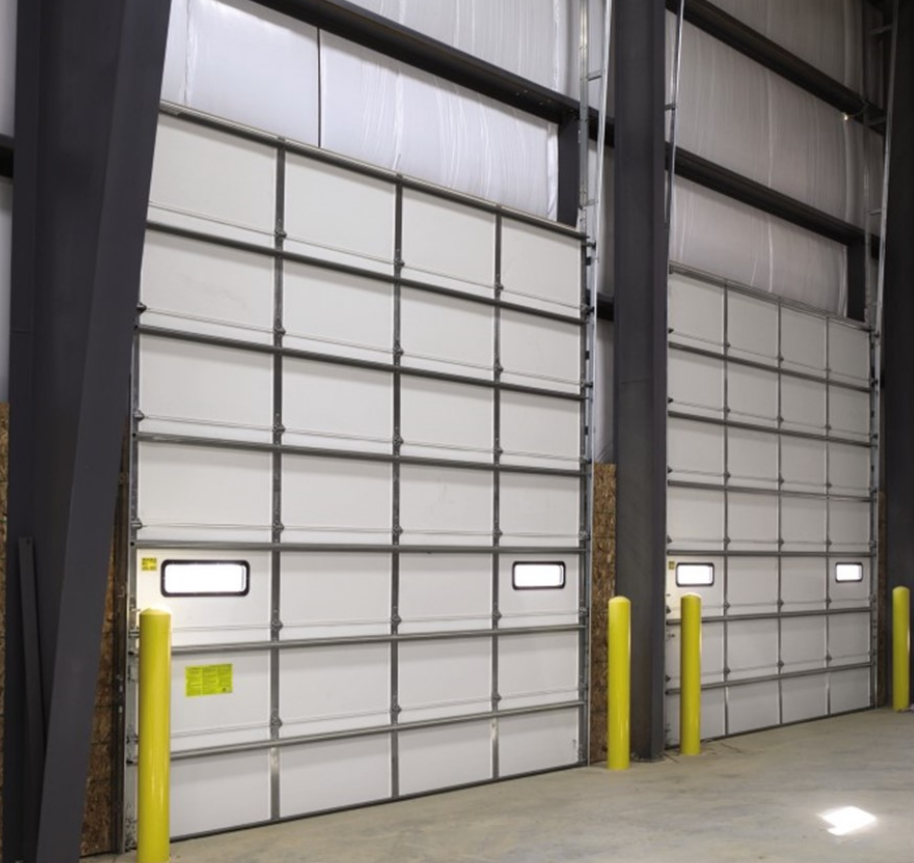 Professional technician providing commercial garage door repair services in Fort Pierce, FL, ensuring reliable and efficient solutions for businesses.