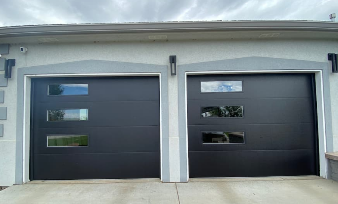 Custom garage door repair services expertise showcased in Fort Pierce FL, featuring a skilled technician working on a residential garage door.