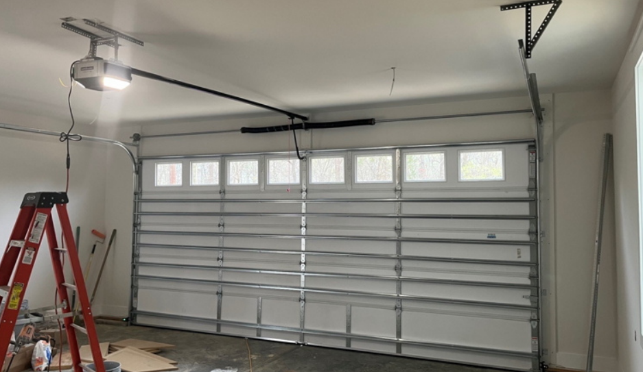 Technician providing professional garage door repair service in Fort Pierce, FL
