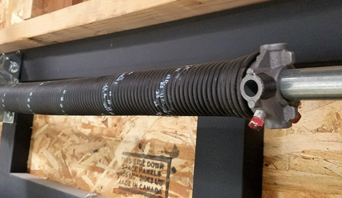 Garage door spring repair service in Fort Pierce, FL - Expert technicians fixing broken springs"