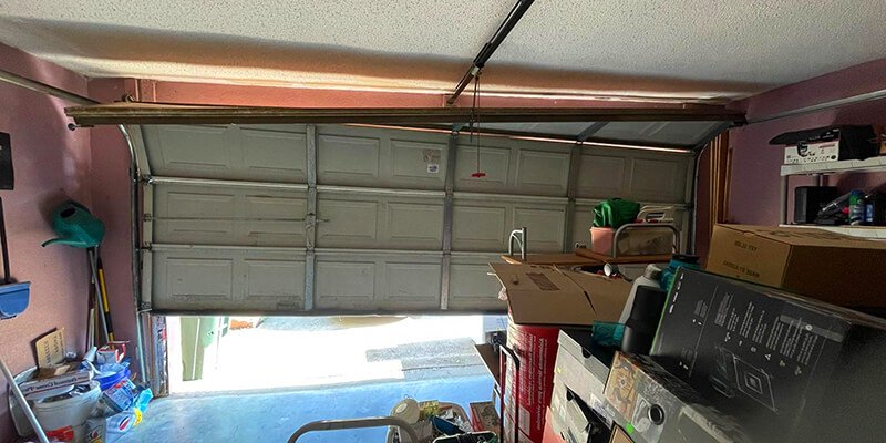 Professional team providing overhead garage door repair services in Fort Pierce, FL, enhancing garage door performance and safety.