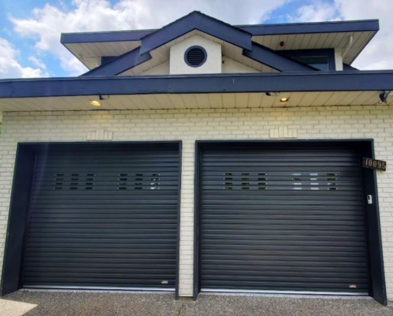 Professional technician repairing a garage door in Fort Pierce, FL, highlighting expert garage door repair services for residential and commercial properties."