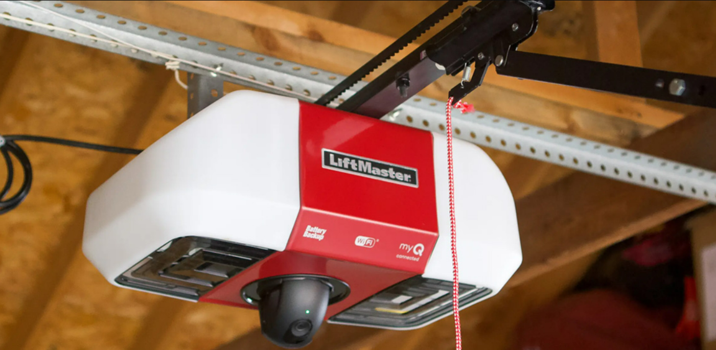 a professional technician repairing a garage door opener with tools, representing expert garage door repair services in Fort Pierce, FL.