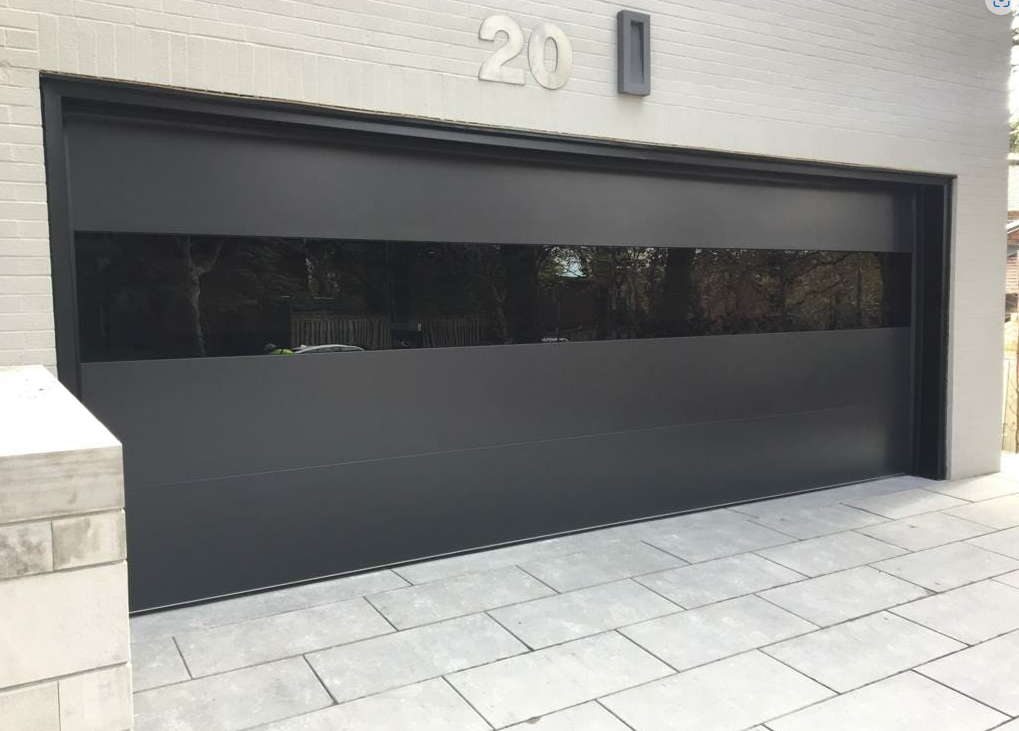 Professional technician repairing a garage door in Fort Pierce, FL - Expert garage door repair services